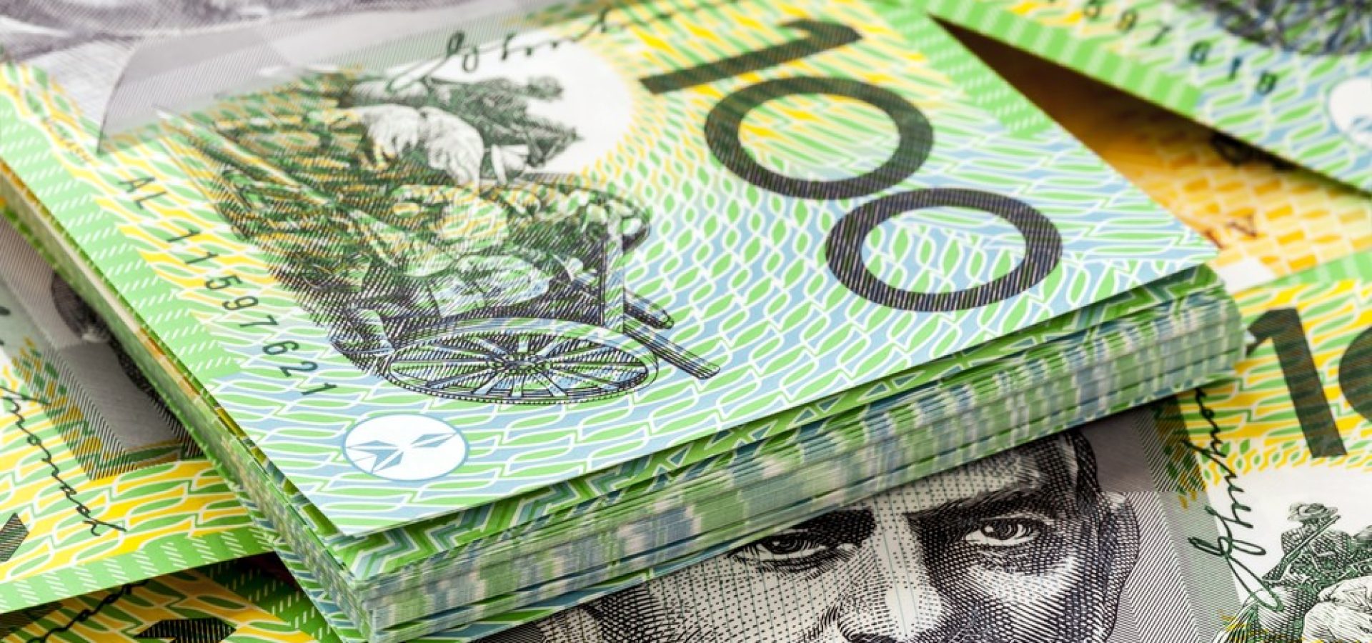 Wibest – GBP AUD: A stack of hundred Australian dollar bills.