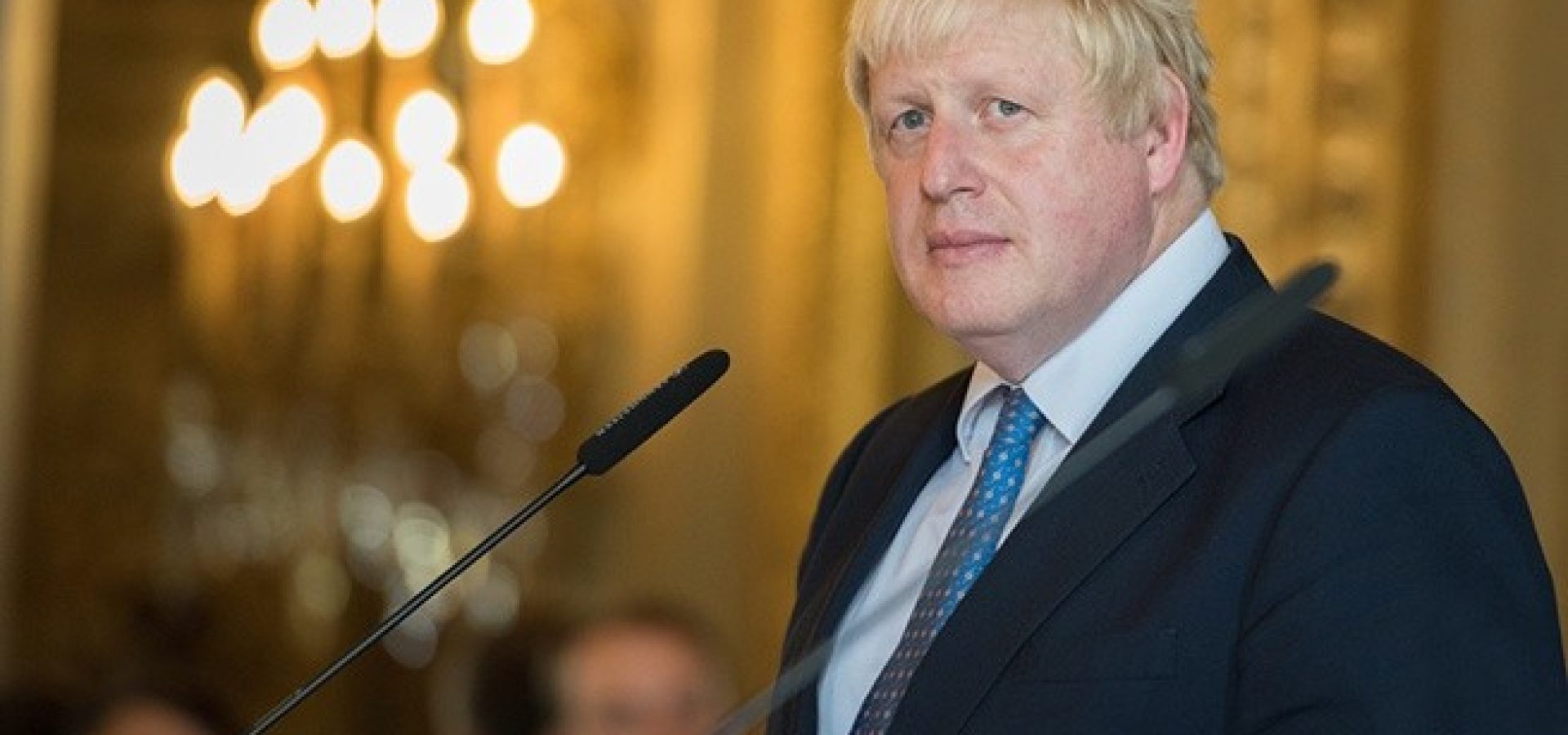 Wibest – Brexit: British Prime Minister Boris Johnson standing in front of a podium.