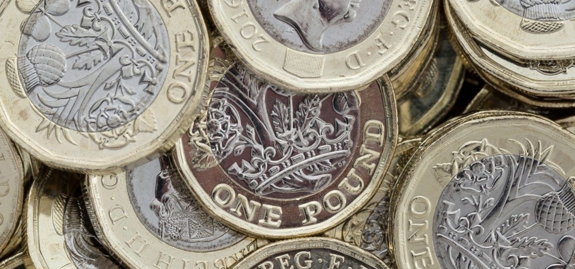 Wibest – GBPUSD: A close up shot of pound sterling coins