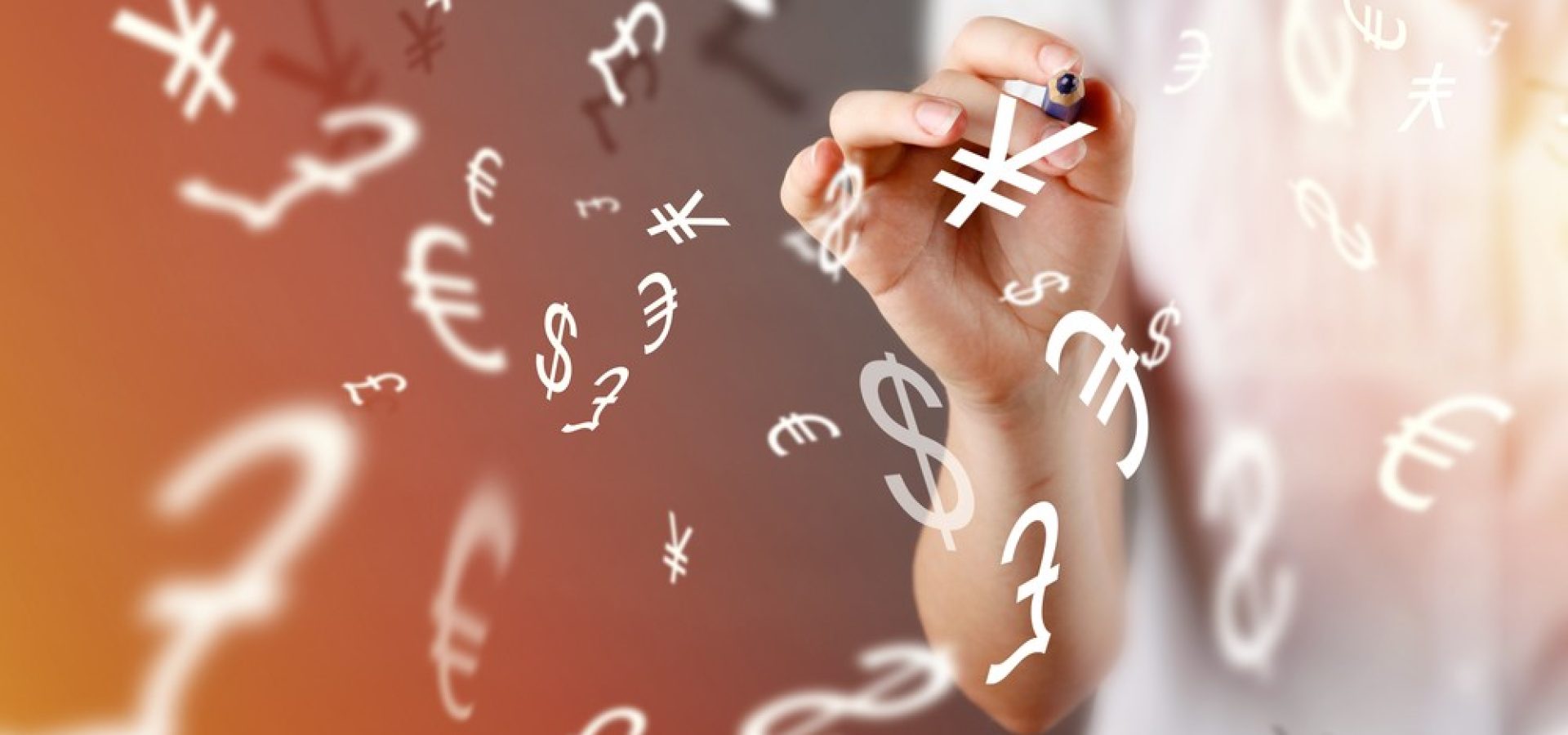 Wibest – Trading: A woman writing different currency symbols.