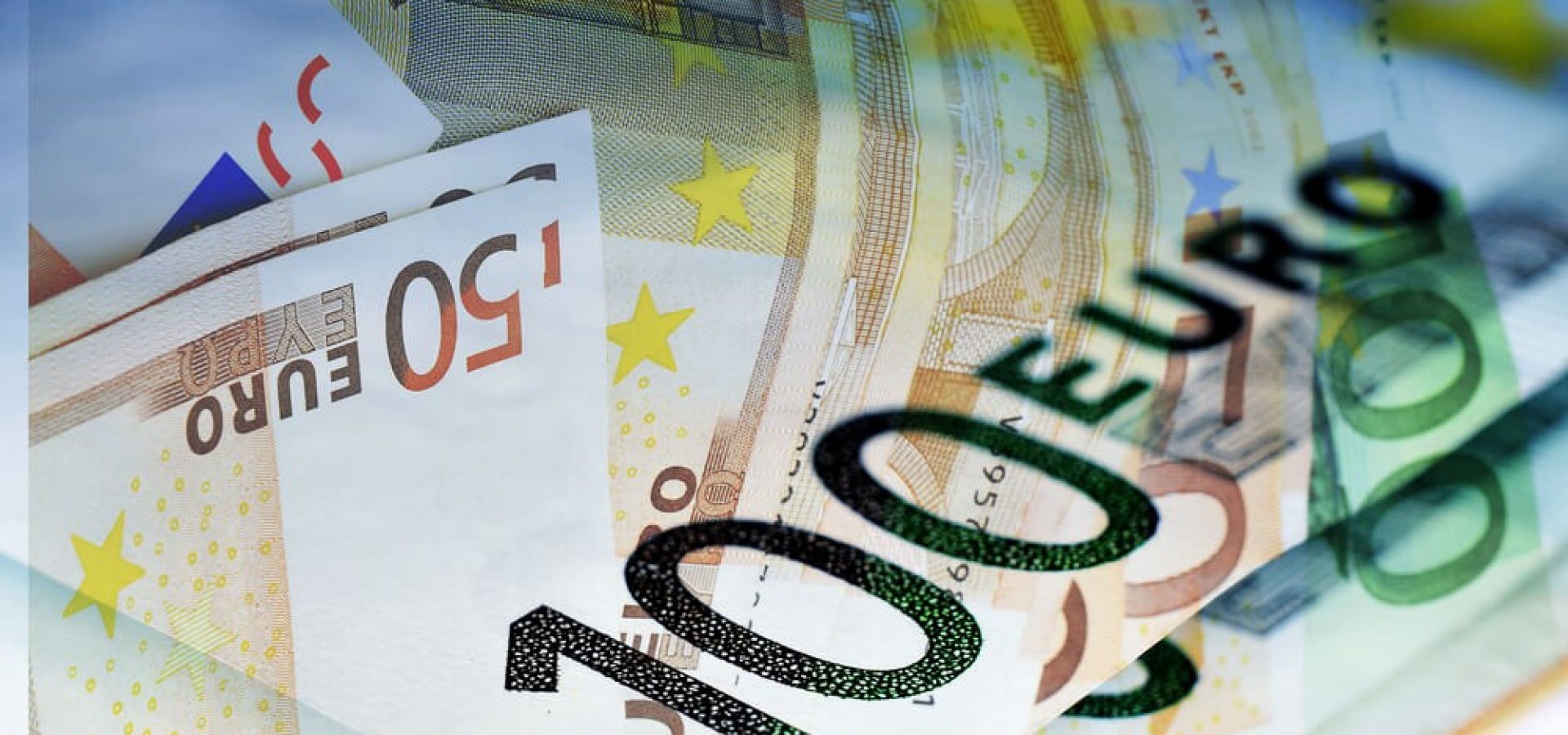 Wibest – Eurozone Crisis: Close up of some 100 and 50 euro bills