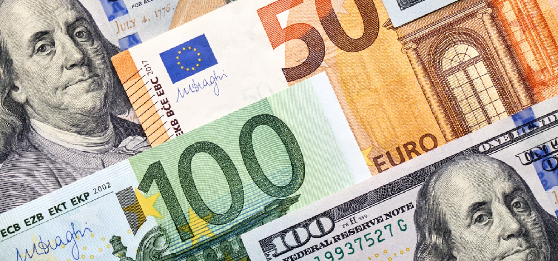 Wibest – EUR USD: Single currency and US dollar bills.