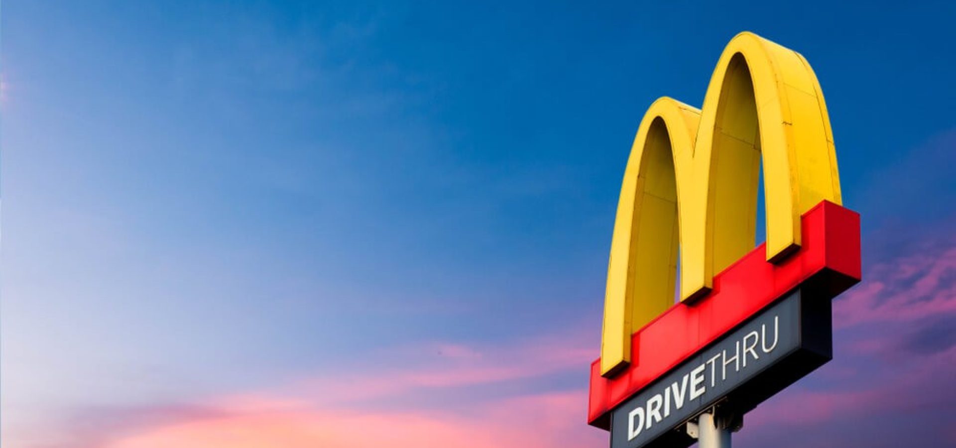 McDonalds: McDonald’s logo on the sky background.