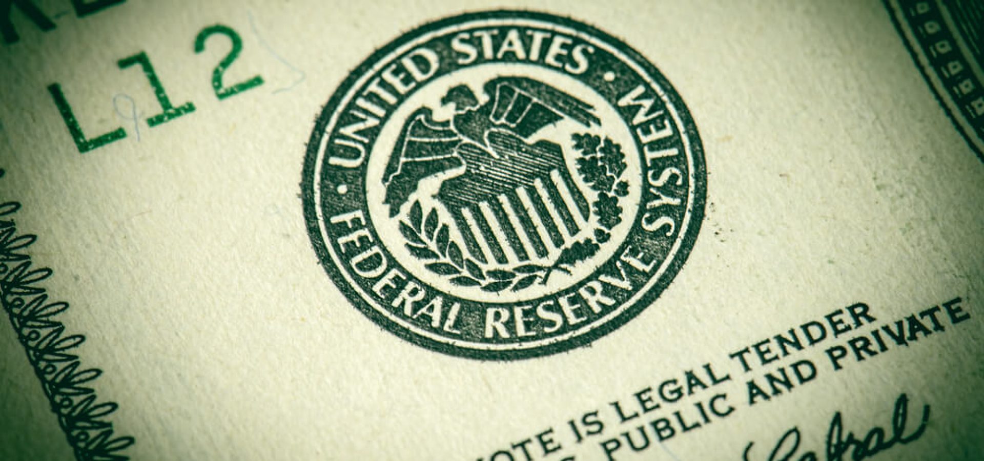 Federal reserve seal on dollar bill